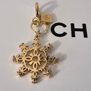 CHANEL Gold Snowflake Pendant